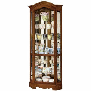 howard miller 680250 jamestown II corner curio in a medium oak finish with adjustable shelves and etched front door glass