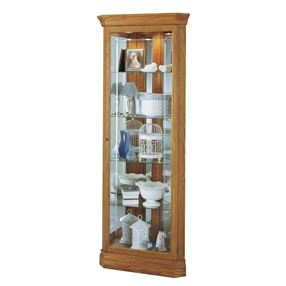 6 foot tall howard miller corner curio with etched glass finished in golden oak